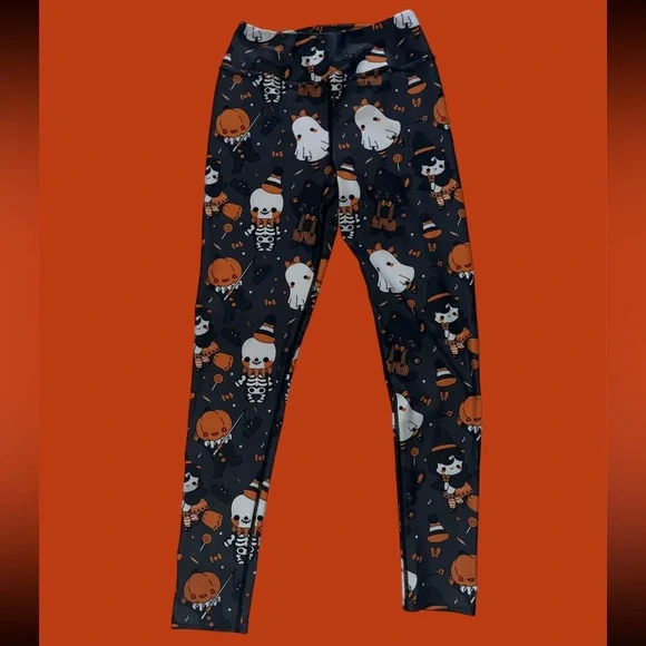 Halloween themed leggings ghost, black kitty, witch, skeleton, and candy - Picture 2 of 3